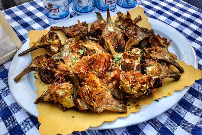"Carciofo alla giudìa" - crips fried artichokes are delicacy typical for Jewish Ghetto in Rome "Carciofo alla giudìa" - crips fried artichokes are delicacy typical for Jewish Ghetto in Rome