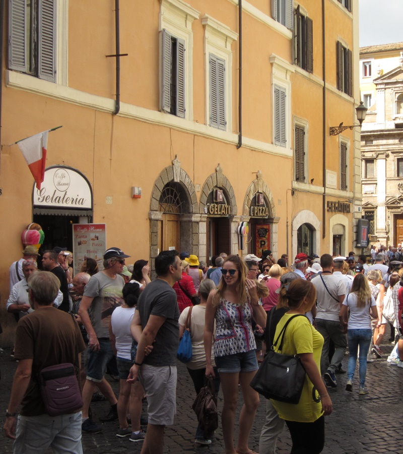 Tourists in historic centre of Rome