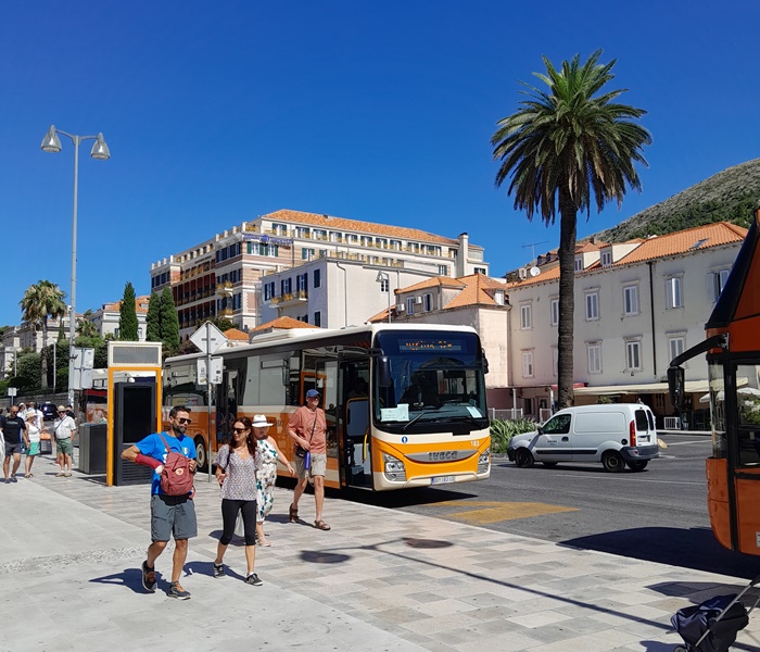 City buses parked near the Pile Bus Stop at the western entrance to Dubrovnik Old Town