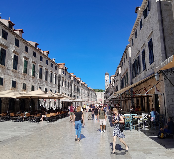 People walking along Stradun, the main street in Dubrovnik’s Old Town