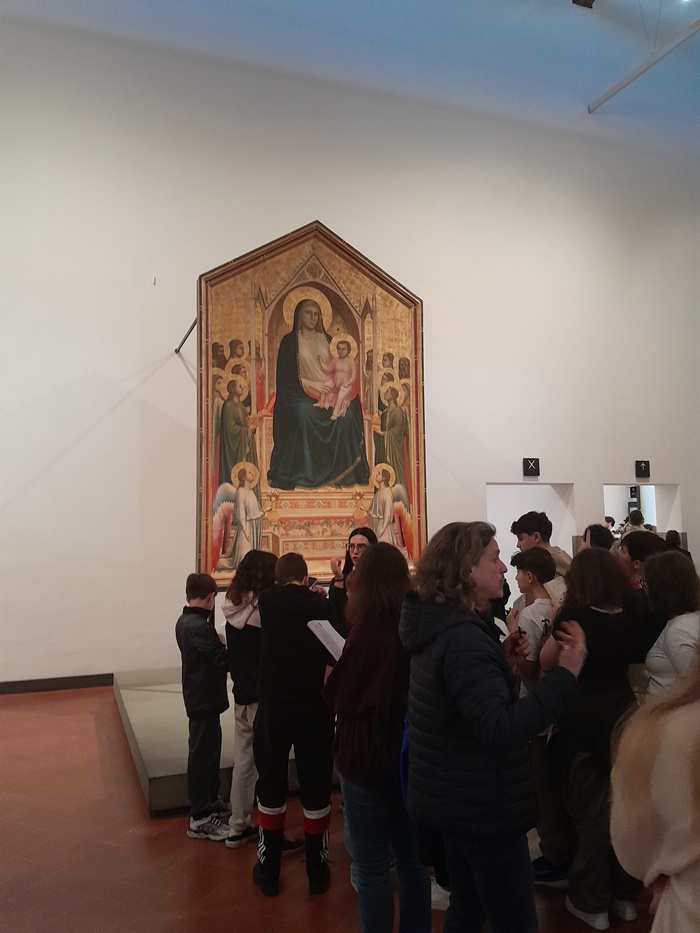 Giotto's Virgin and Child enthroned, surrounded by angels and saints