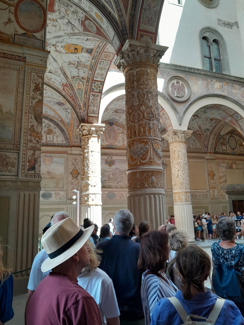 The architecture of the Palazzo Vecchio Courtyard is a captivating blend of medieval and Renaissance styles. The Palazzo Vecchio Courtyard