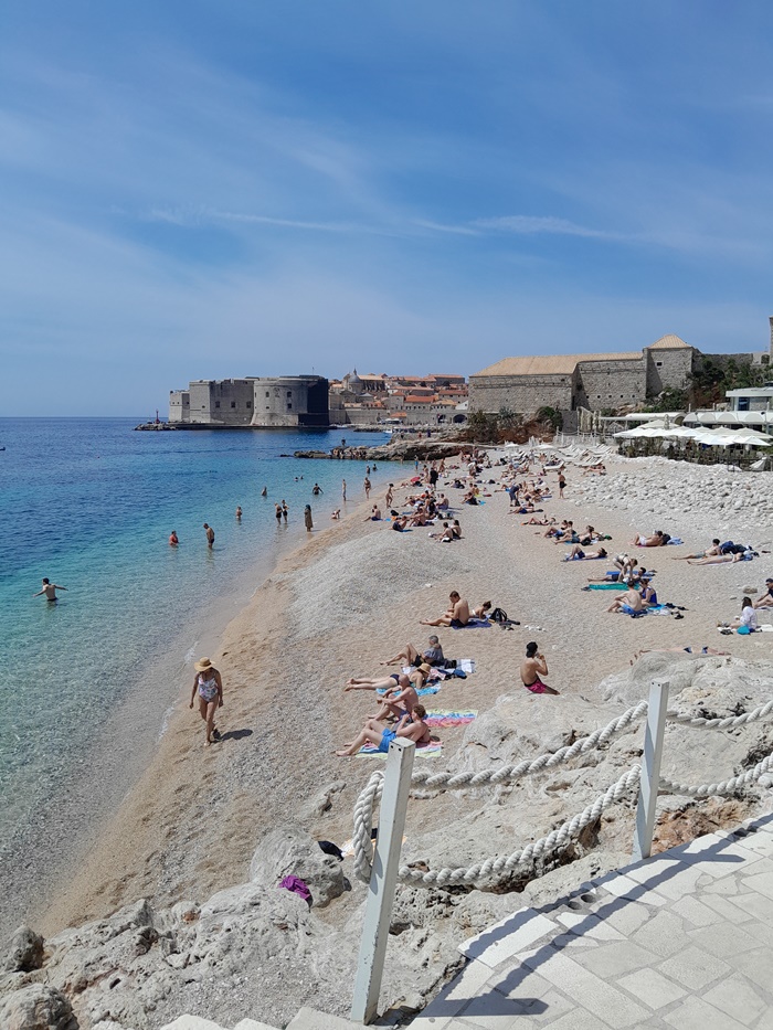 Spend your days sunbathing and swimming on Banje beach