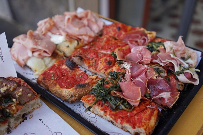 You'll be eating appetizing pizza on Rolling Rome golf cart food tour