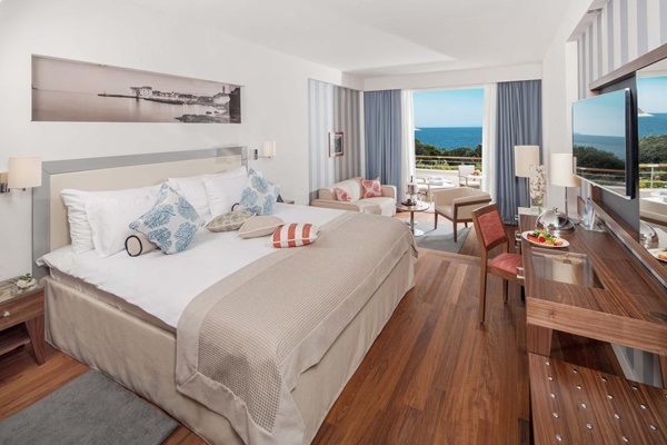 A comfortable guestroom at Dubrovnik President Valamar Collection Hotel