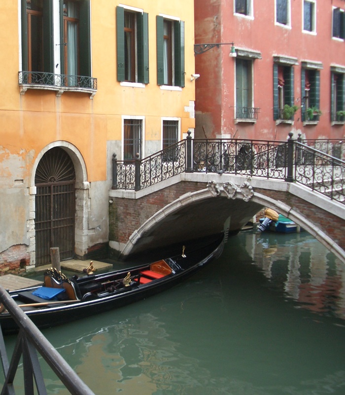 A Venetian bridge and gondola A Venetian bridge and gondola